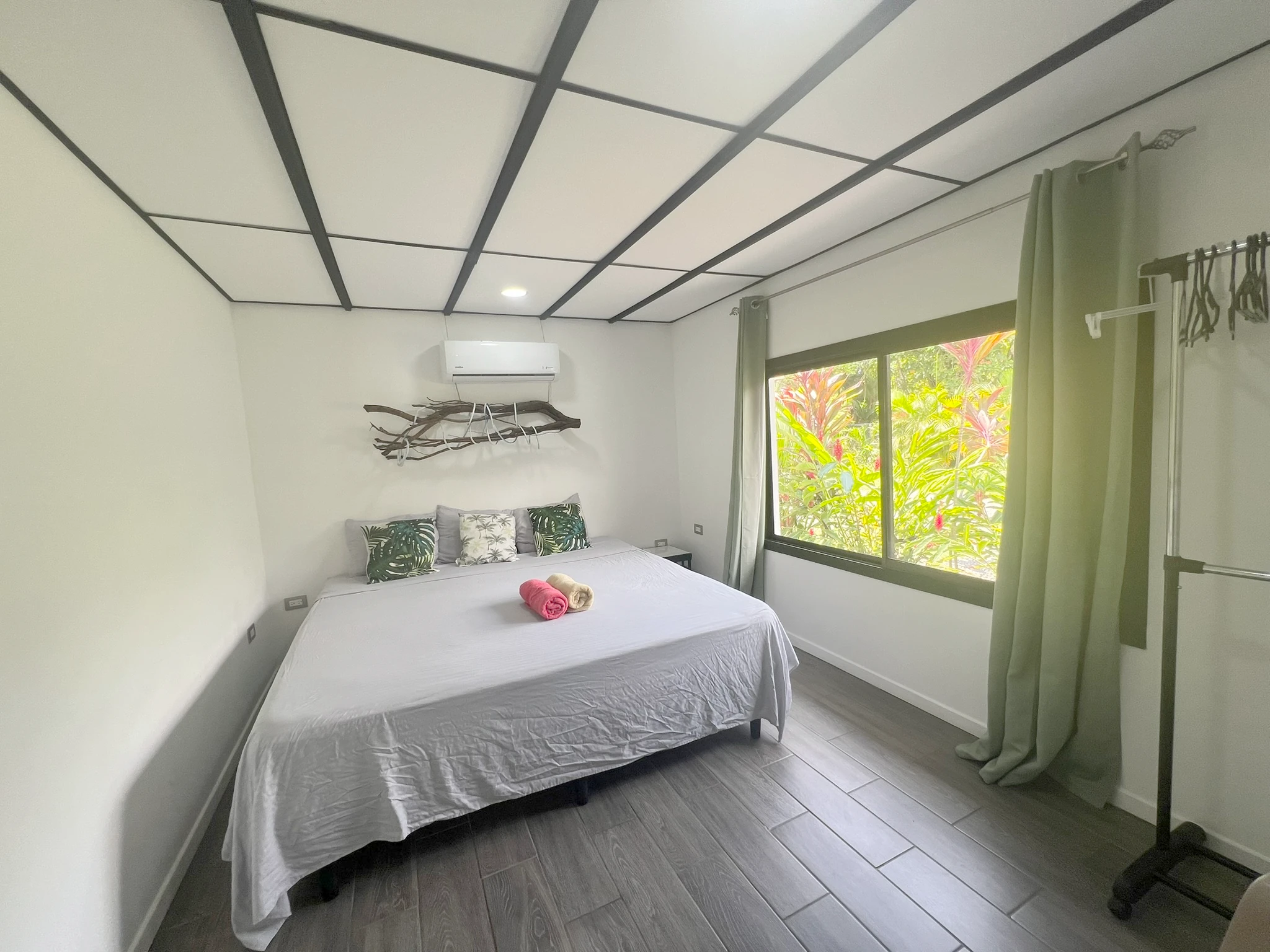 A room with a king bed